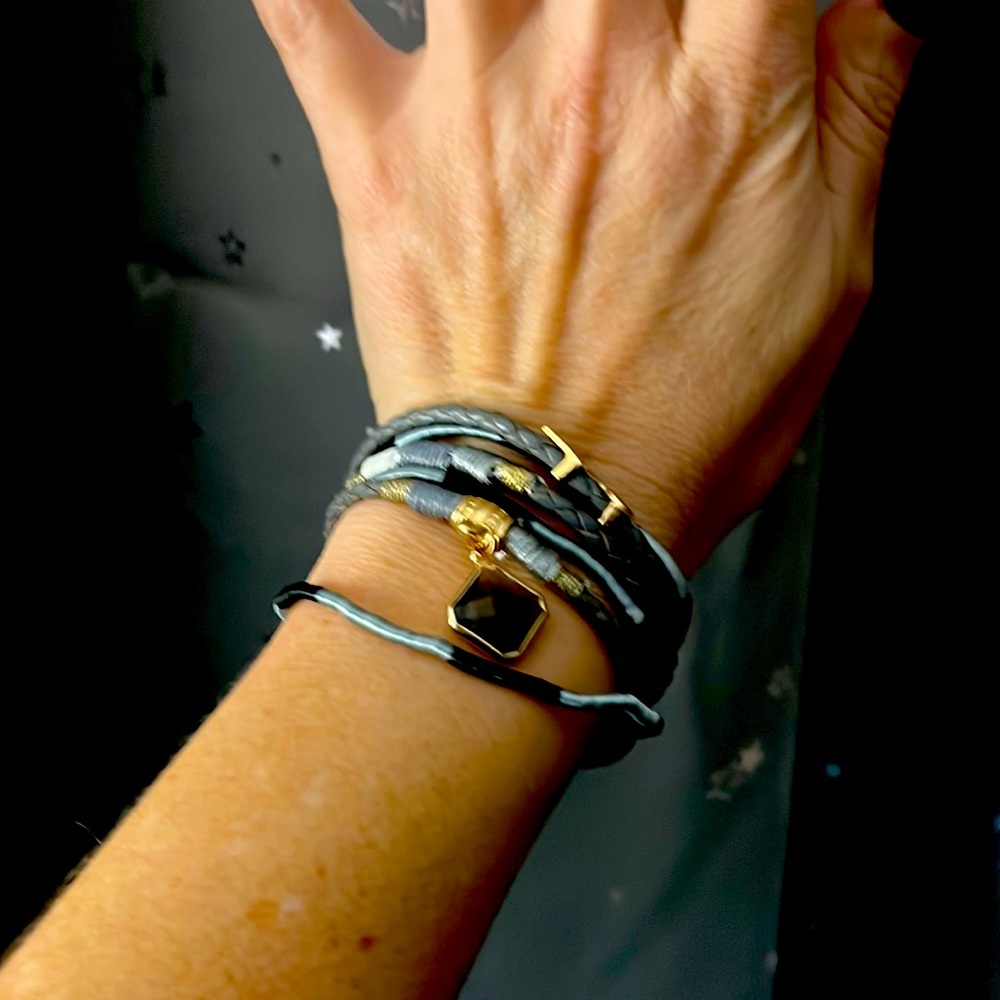 Gray silver and gold leather and string bracelet
